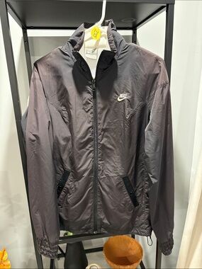 275 Nike woman’s Dark Gray Full-Zip Windbreaker Jacket